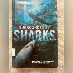 SURROUNDED BY SHARKS By Michael Northrop